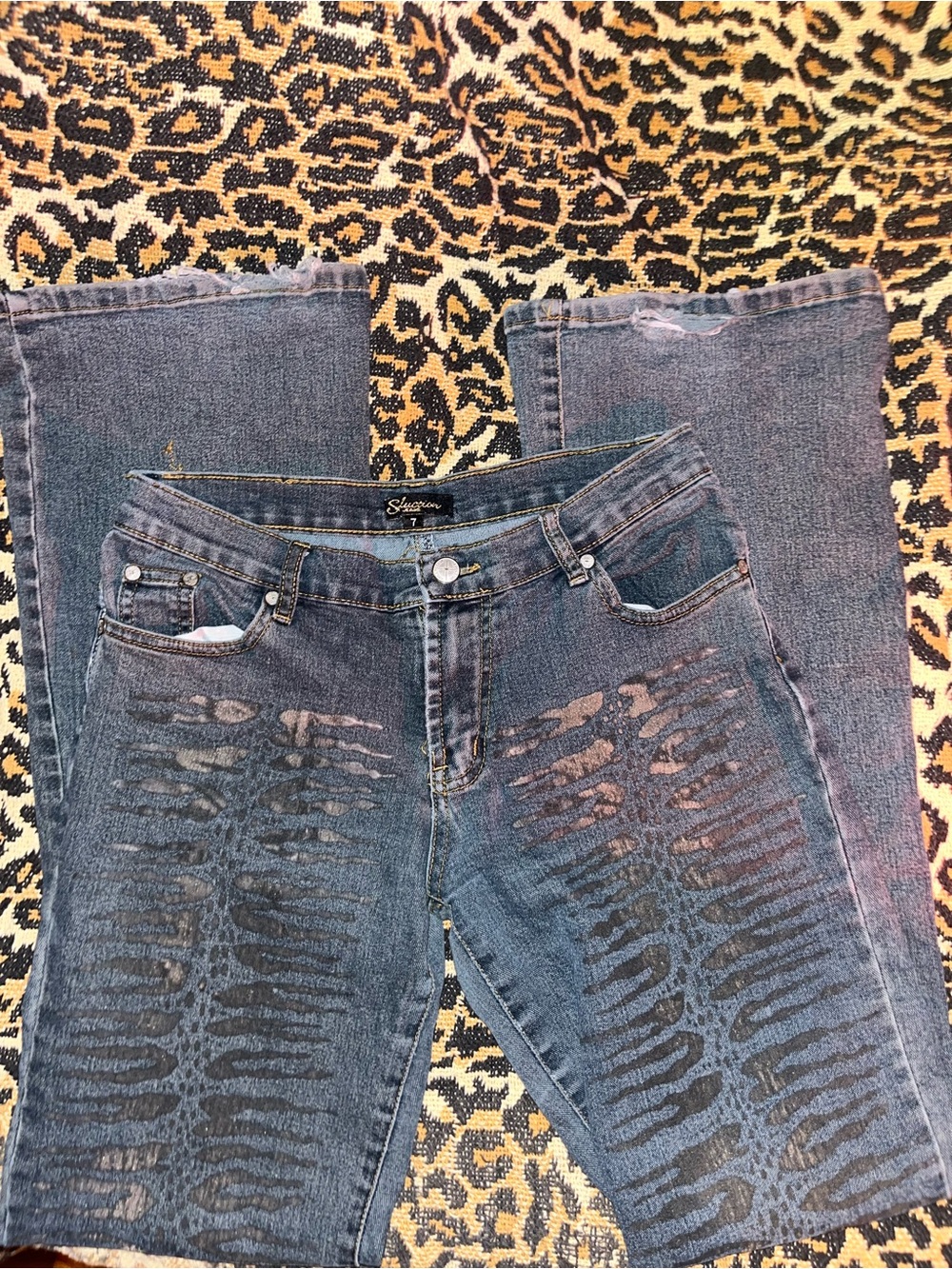 Y2K seduction zebra print distressed flare jeans